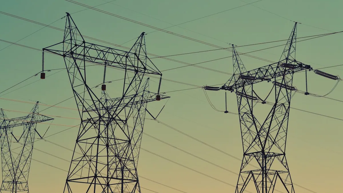 Manipulating Demand Forecasting AI to Create Cascading Blackouts